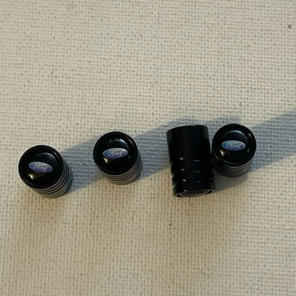 Ford valve Stem caps in Black set of 4 NWT